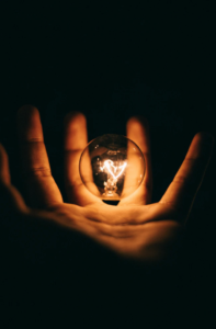 Hand with lightbulb in it