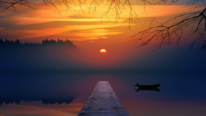 sunset over a lake like a lucid dream